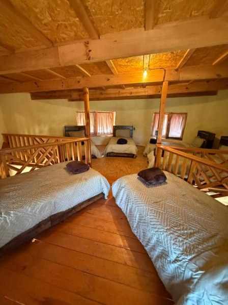 Beds in the open loft of the Hormiguero