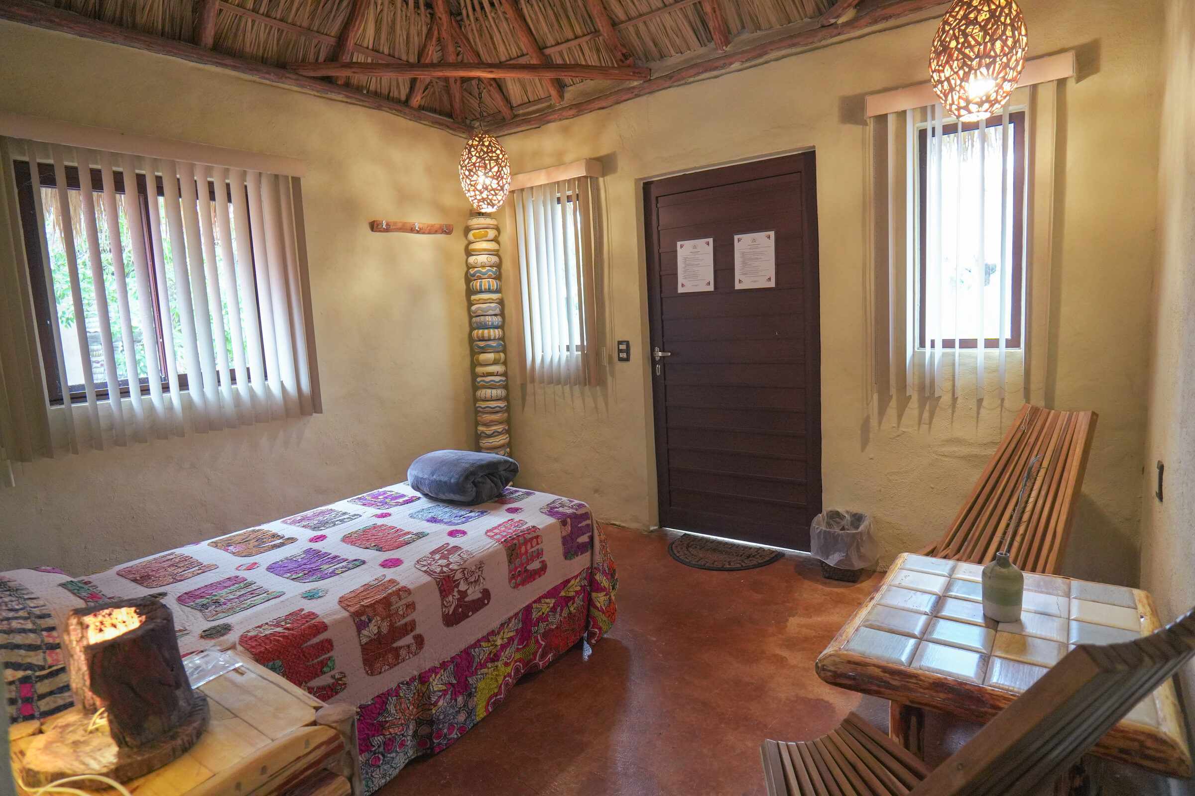 Guest room under a palapa roof