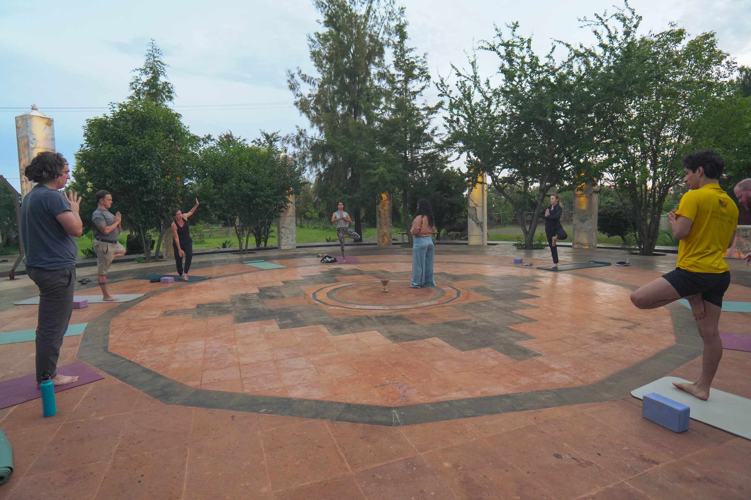 Yoga on the Oracle's stone circle, between its pillars