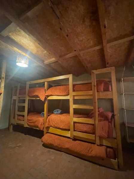 Wooden bunk beds downstairs